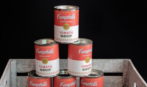 pile up of Campbell's tomato soup cans