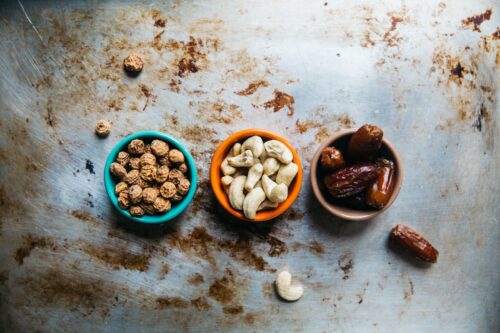 three bowls of nuts