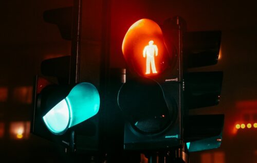 a traffic light with a red light and a green light